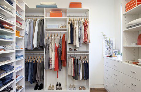 White Themed Walk in Closet with Drawers Shelving and Closet Rods