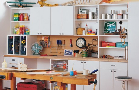 White Garage Storage with Closet Cabinets Shelves Drawers and Light Grain Work Space and Tool Rack