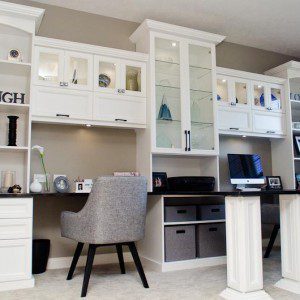 Erin Moore Designer Gallery White Office Space with Drawers Lighted Display Shelving and Built in Desks with High Gloss black Tops