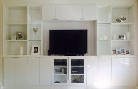 White Built in Media Center with Shelving Cabinets and Built in Lighting