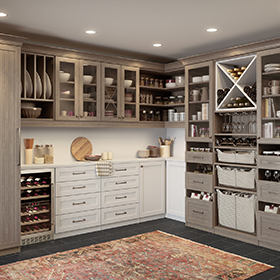 Wood Grain Grey Pantry Storage with Shelves Drawers Built in Baskets Wine Rack and Fridge Glass Fronted Cabinets and White Work Space