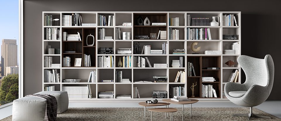Light Grey Themed Library with Seatting Coffee Tables and Shelving with Dark Brown Accents