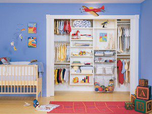 Children's White Reach in Closet with Shelving and Built in Metal Baskets and Closet Rods