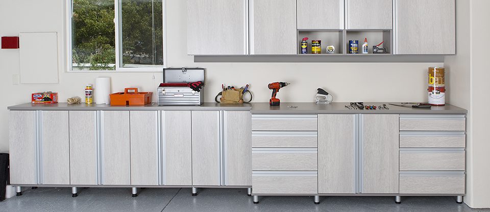 Light Grey Garage Storage with Work Space Cabinets and Drawers with Metal Accents
