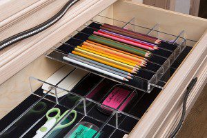 Close Up of Light Wood Drawers with Clear Office Supply Organizers