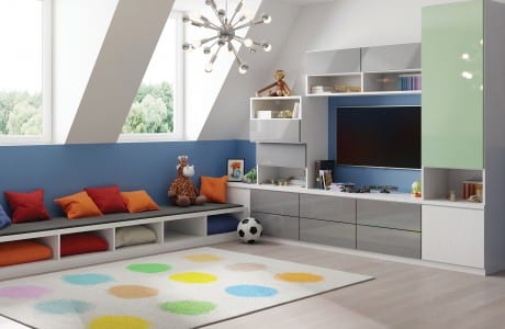 Kids living room space with an entertainment center and toy storage and built in bench seating