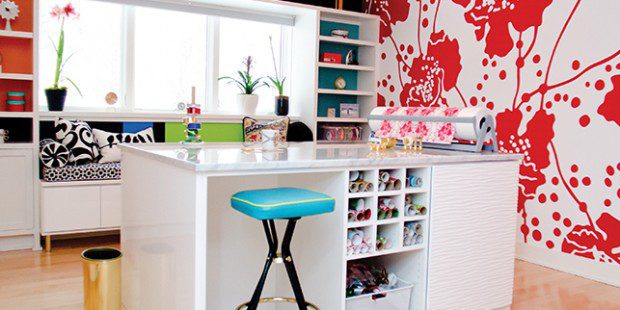 Colorful Craft Room with White High Gloss Shelving Cabinets Built in Window Seating and Stand Alone Workspace