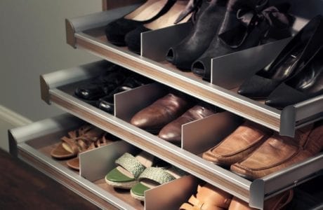 Close Up of Light Brown Pull Out Shoe Storage Drawers with Metal Accents