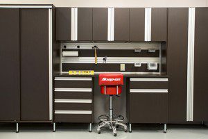 Dark Brown Garage Storage with with Drawers Cabinets and Work Space and Tool Rack