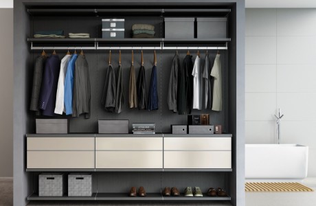 Dark grey modern closet reach in system with shelving closet rods and drawers