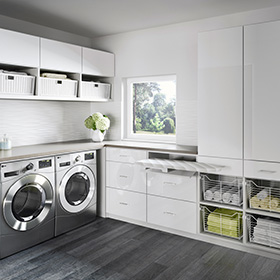 High Gloss White Laundry Storage with Cabinets Drawers Baskets and Foldout Ironing Board