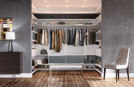White Backed Walk in Closet with White Stand Alone Bench Closet Rods Shelving and Grey Cabinets