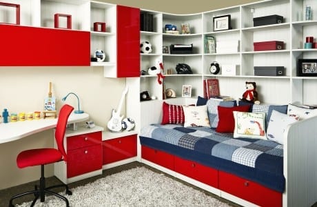 White Themed Kids Room with Built in Bed Desk Shelves and High Gloss Red Fronted Cabinets and Drawers