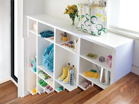 White Tiered Staircase Storage With Shelves and Cubbies