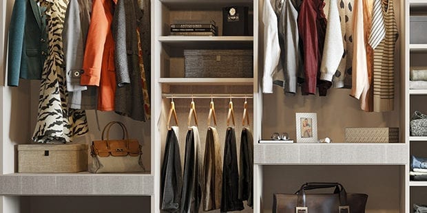 Reach in Closet with Grey Shelving Closet Rods and Built in Lighting