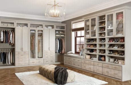 Beige Walk in Closet with Display Cabinets Shelving Closet Rods and Built in Seating