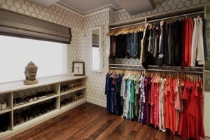 Liberté Chan's custom walk in closet detail with extra hanging racks and shelving