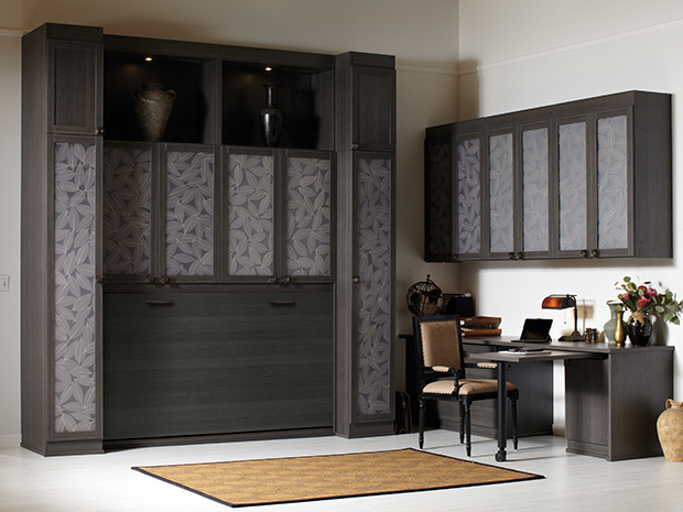 Interior LED puck lighting in a wardrobe closet created by California Closets