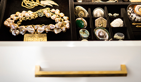 Susan Ferrier Client Story Close Up of White Jewelry Drawer with Brass Handles