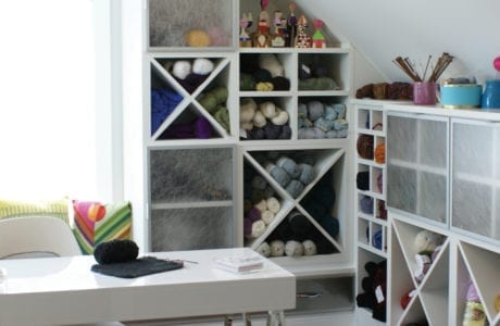 California Closets White Shelving and Cubbies for Craft Room