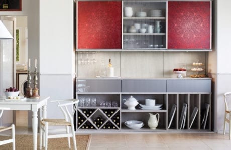 Grey pantry design with shelving wine display and red accent cabinets Northern New Jersey