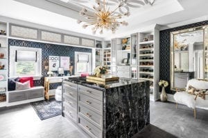 Marbled island in the middle of the renovated closet for California Closets clients Sabrina and Scott McGillivray