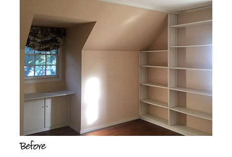 Empty cream colored closet with shelving before installation