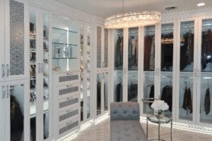 California Closets Michelle Mangini Client Story white glass cabinets clothing