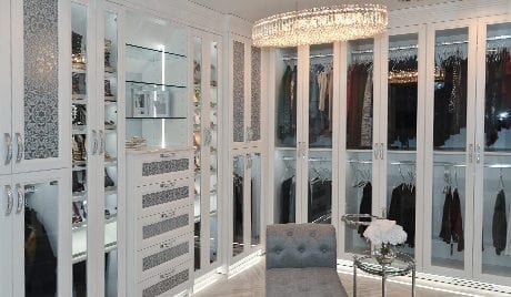 California Closets Michelle Mangini Client Story white glass cabinets clothing