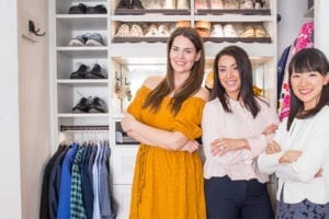 California Closets client Katie Hinz-Zambrano posing in her new closet with her designer and author Marie Kondo