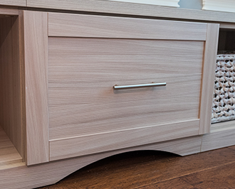 Top10_DetailImage_330x266_Susan Light wood colored cabinet drawers with stainless hardware and naked finish