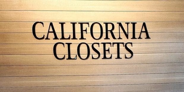 California Closets logo on wooden wall
