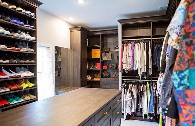 Client Story Stephon and Brittany Tuitt Dark Brown Closet with Colorful Brass Hardware