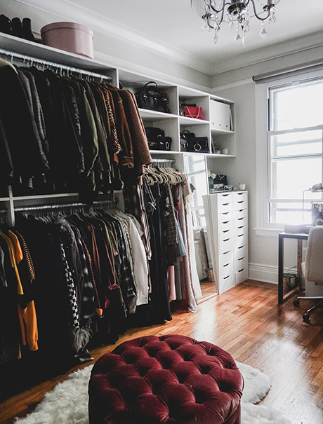 Room with Light Gray Cabinets and Clothing Storage with White Carpeting and Hardwood Floors