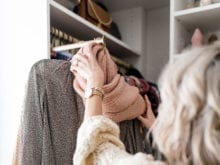 Pull out scarf rack in fashion blogger Brittany Sjogren's walk in closet by California Closets