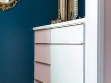 White and pink dresser in blue bedroom for Justine Ma