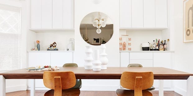 A custom dining room with white cabinetry