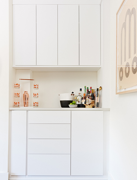 White shelving for wine bar utensils