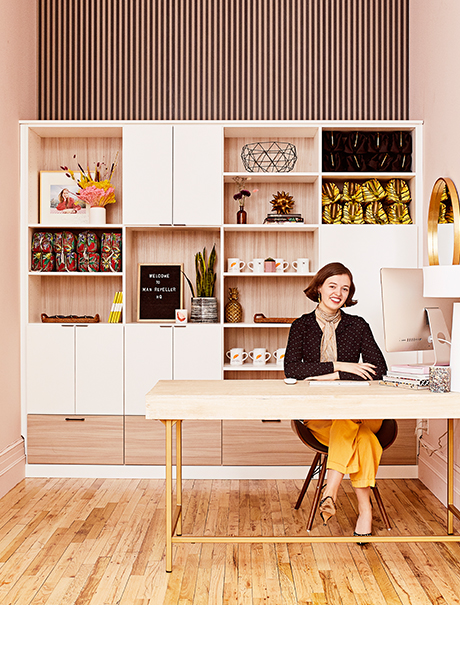 Custom office shelving by California Closets for Man Repeller