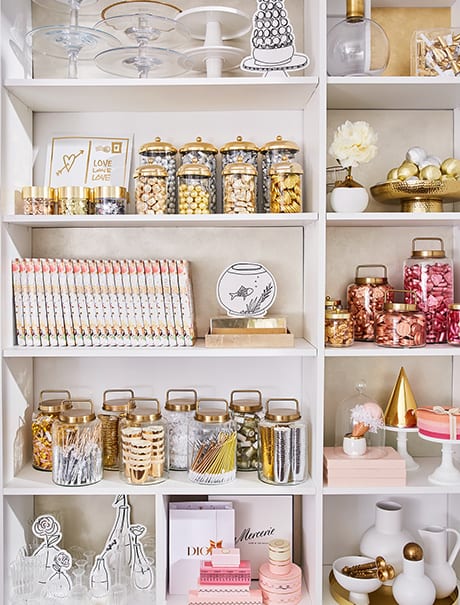 White shelves with organized craft supplies | California Closets