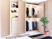Custom light tan reach-in closet with double doors | California Closets