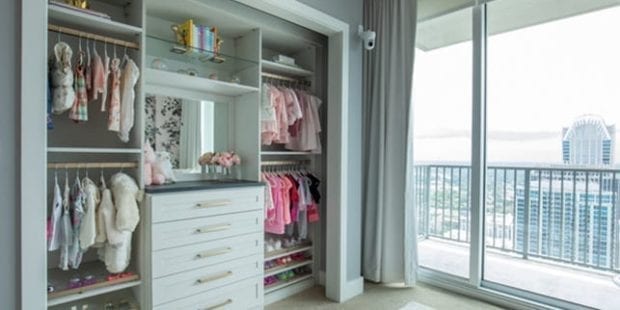 Angela Ruch's baby girl's nursery with white reach in closet and drawers