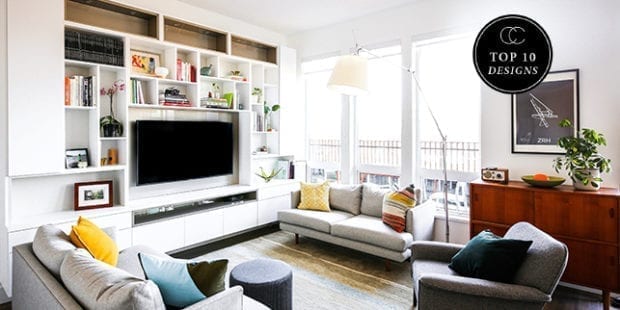 A custom media center with white finish and surrounding shelves by California Closets designer Emma Beaty