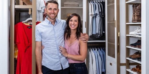 two people posing infront of custom walk-in closet | California Closets 