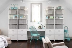 Custom workspace desk with a turquoise chair | California Closets