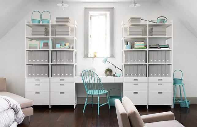 Custom workspace desk with a turquoise chair | California Closets