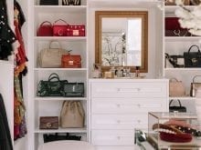 Custom white closet with a gold mirror | California Closets 