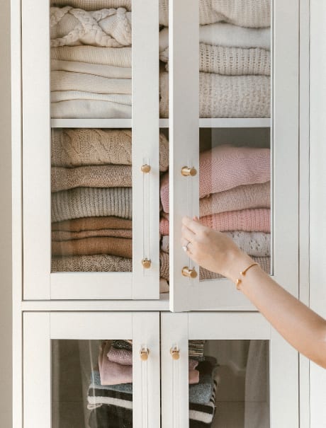 Cabinets with towels | California Closets