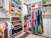 Custom walk-in with colorful dresses | California Closets 