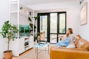 Custom white cabinet with TV | California Closets